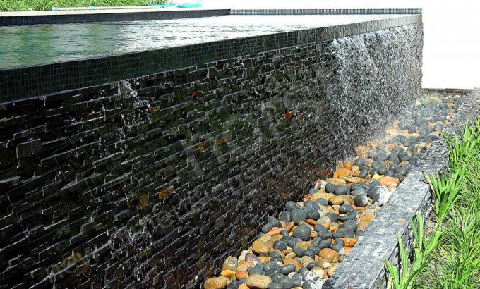 Natural Stacked Ledgestone Panel used in Water Feature on an infinity pool