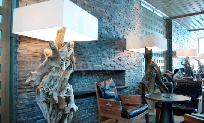Charcoal Rock Panels for Interior Stacked Stone Fireplace in Commercial Lobby airport in Dubai