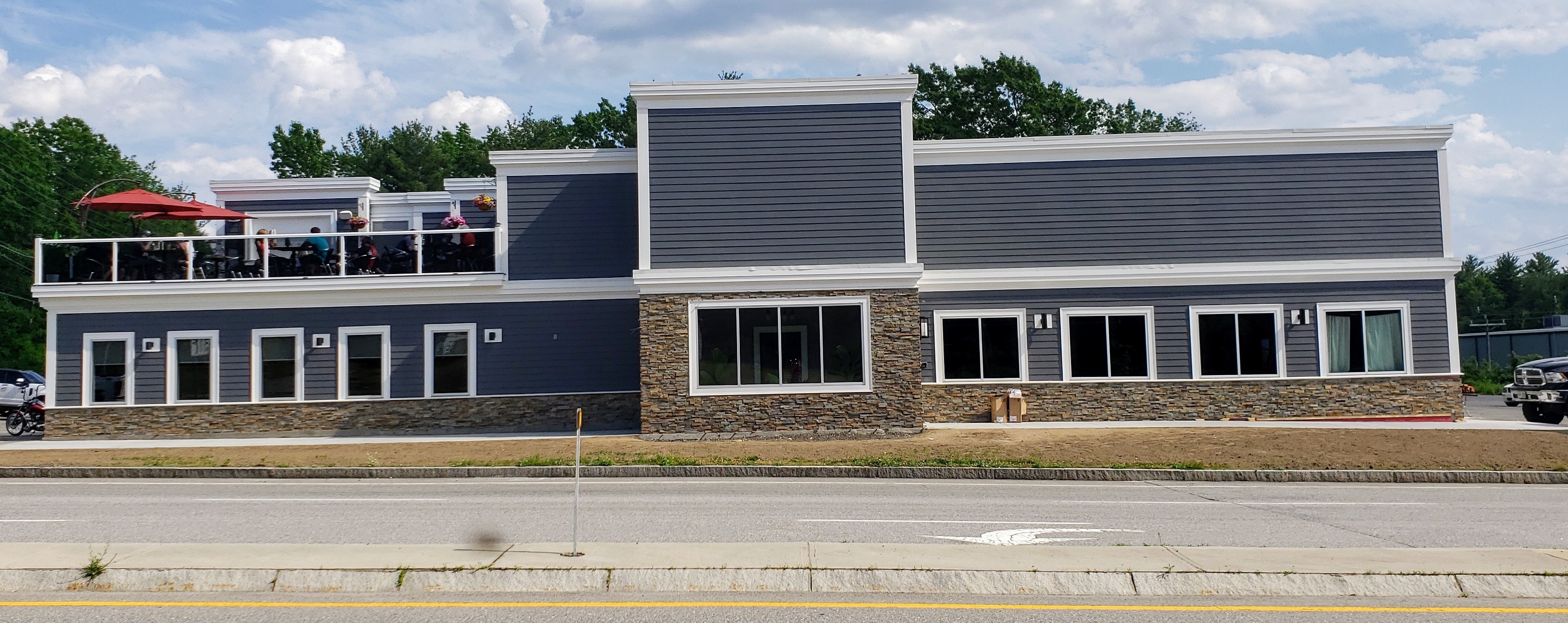 Norstone Ochre XL stacked stone panels used as a wainscoat on a restaurant remodel project