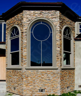 Split face stone ochre house