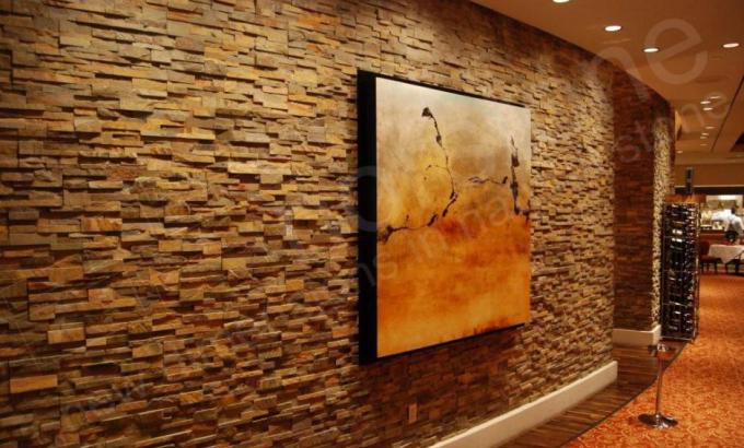 Natural stacked stone feature wall in restaurant