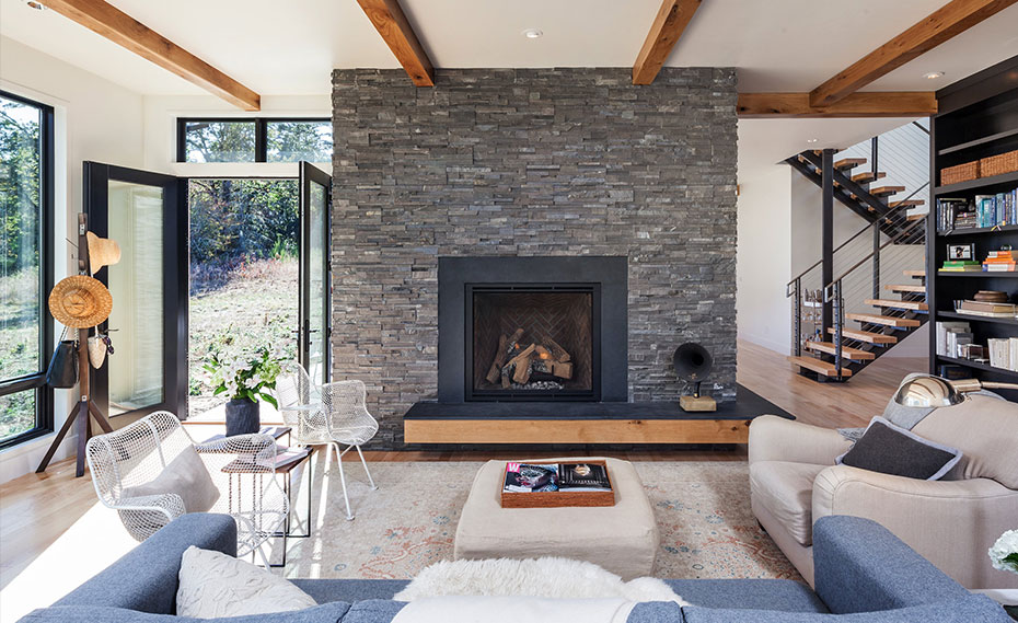 Black Stacked Stone Fireplace - The Arts