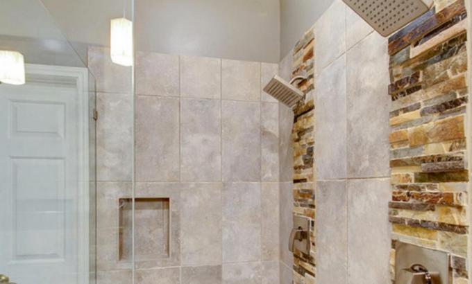 https://www.norstoneusa.com/assets/images/gallery/Natural-Stone-Veneers-Used-in-a-Shower-2_0.jpg