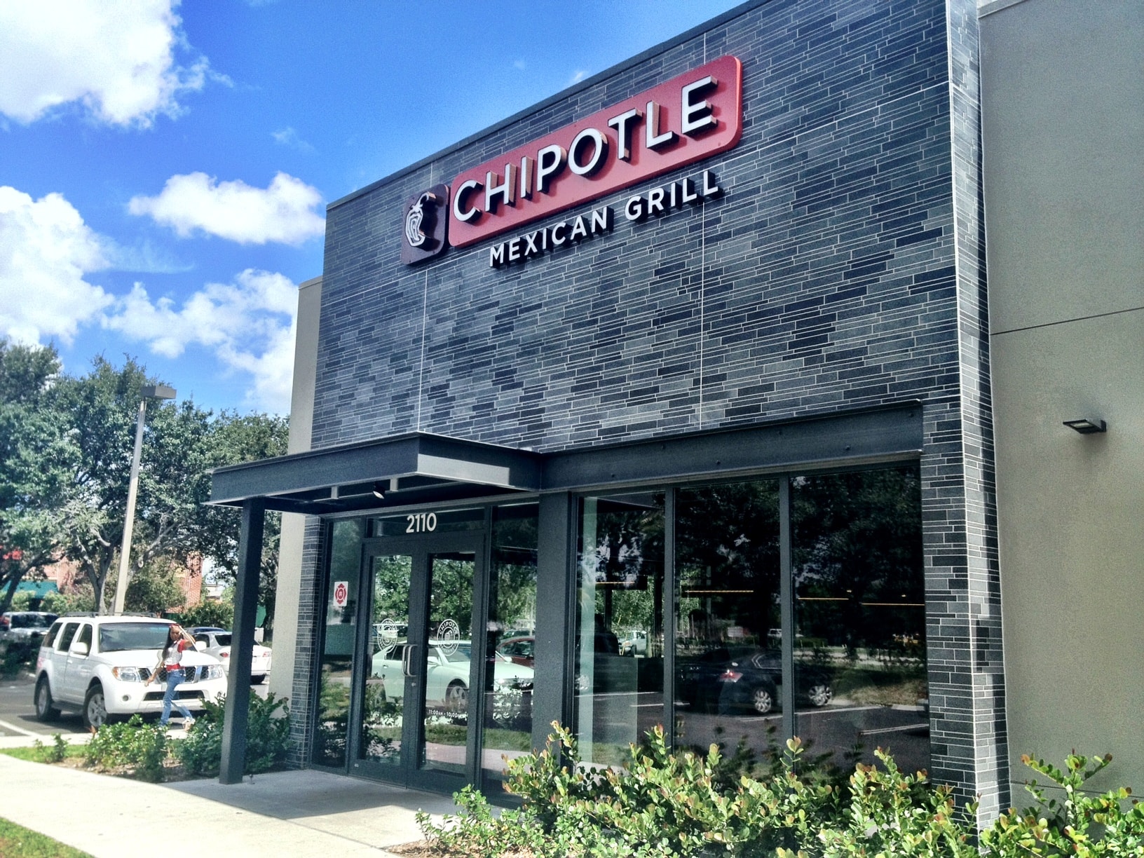 Basalt Mosaic Interlocking Tile adding to industrial look of steel i beam facade at Chipotle in Florida