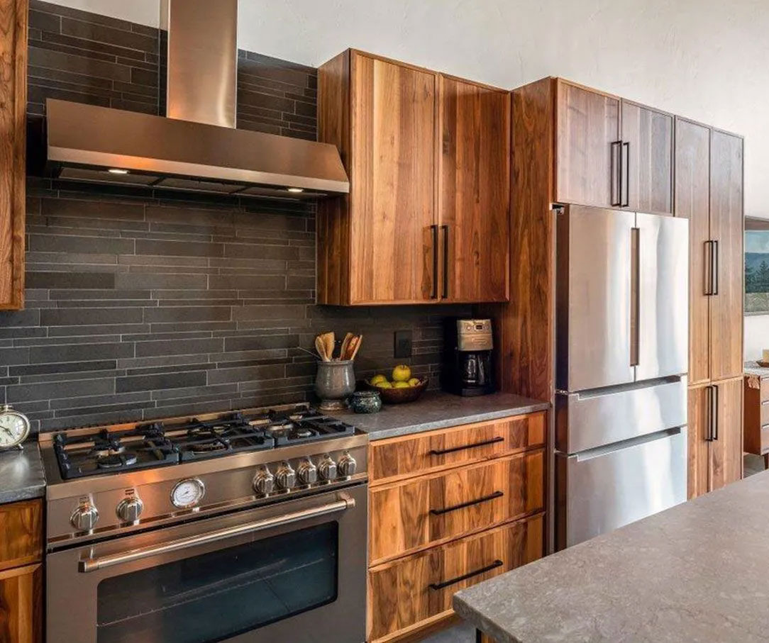 Norstone Grey Basalt Lynia Tile on the backsplash of a rustic styled modern kitchen.