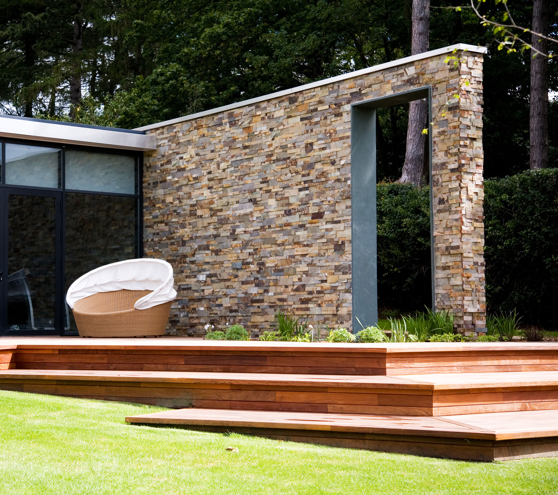 Ochre Blend Stacked Stone Entryway on this beautiful modern home in London England