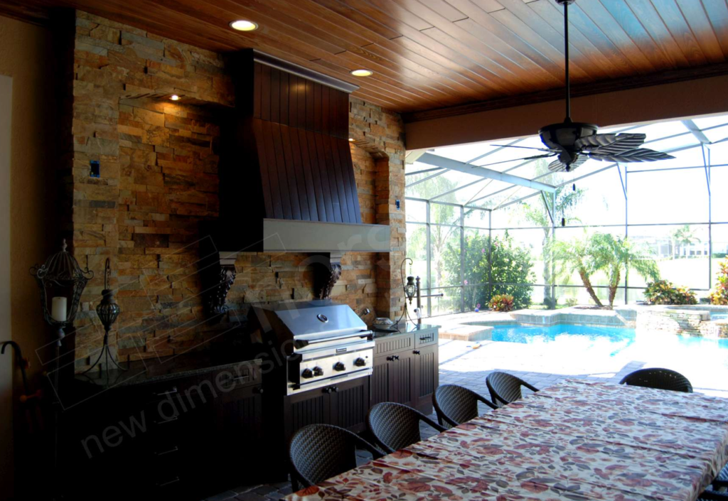 Ochre Stacked Stone as a backsplash with beautiful hoo in this stunning outdoor patio